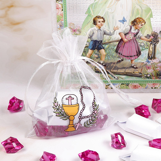 Material bags as a gift package for a child for the first Holy Communion